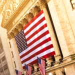 nyse-with-american-flag-1 theinvestmentnews.com